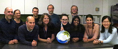 DC staff with award from Miriam's kitchen