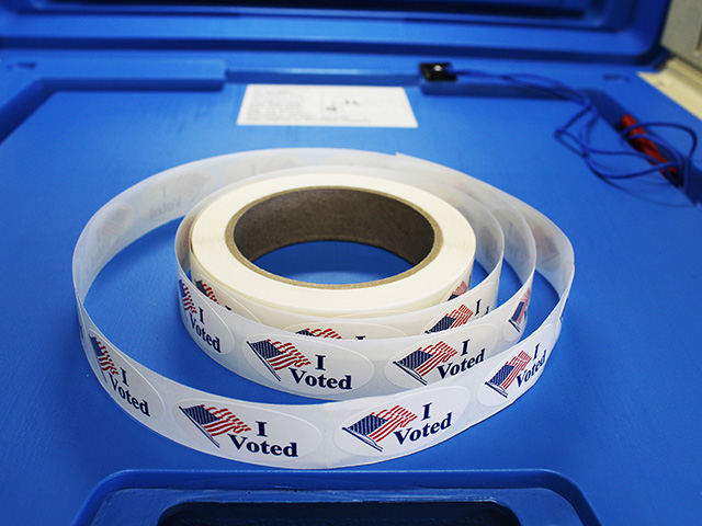 "I Voted" stickers in a voting booth