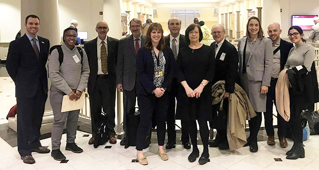 Ronette, fifth from right, attends a Senate hearing in Annapolis with fellow researchers.