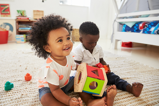 Toddlers playing in preschool