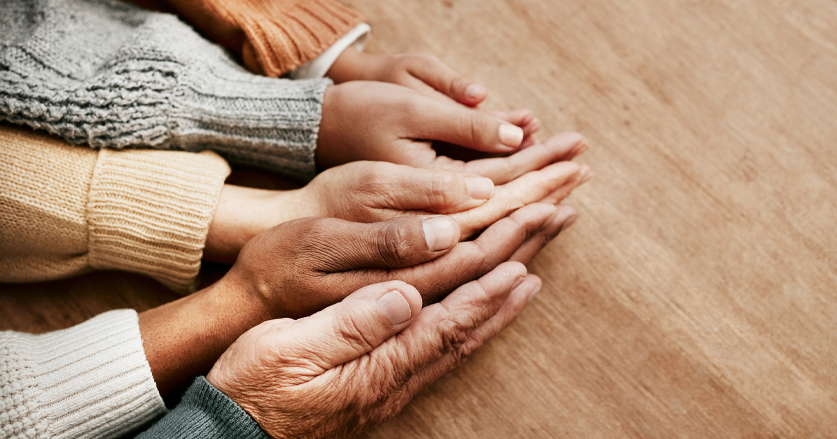 The right hands of a diverse group of people