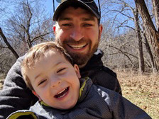 Scott Baumgartner enjoys time with his 2-year old son.