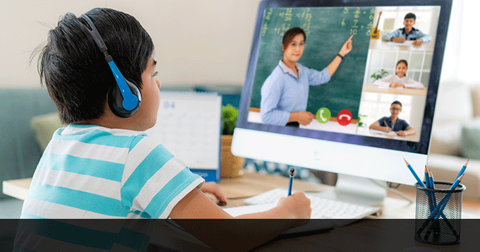 Elementary school boy learning math online