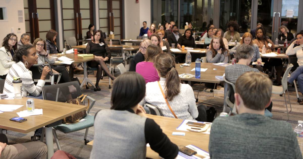 Group of women having a discussion at a community meeting