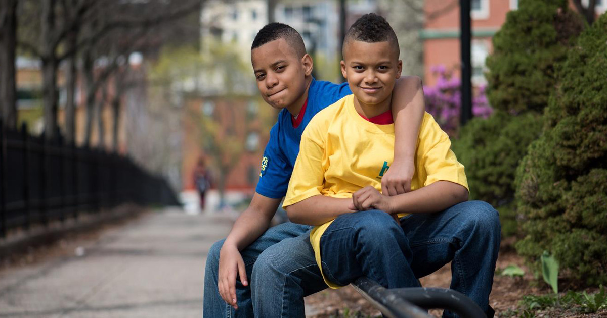 Two boys sitting together