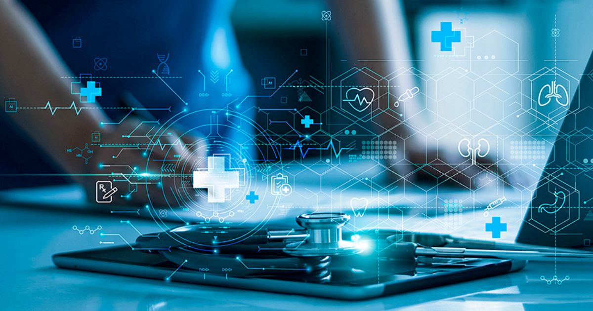 A stethoscope, a tablet, and a laptop on a desk are overlaid with medical icons and data graphics, representing digital health technology and telemedicine concepts.